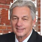 John R. Stokes Logo