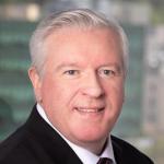 John P. Corrigan Logo